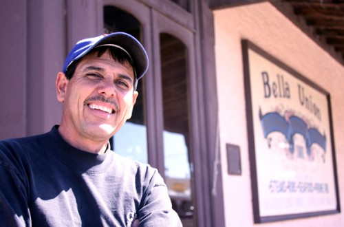 Real estate investor Ruben Suarez still has high hopes of contributing toward Tombstone’s history despite an ongoing bankruptcy. The Bella Union, background, is his most treasured asset, one he says aligns with his love of the town’s history. (Photo by Kevin Zimmerman/ASNS)