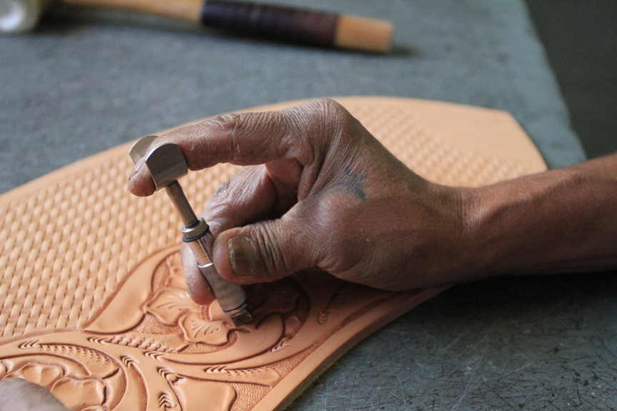 It takes days of working leather by hand before it becomes a custom-made saddle from Talabartería Rancho Grande in Magdalena, Sonora. (Photo by Samantha Sais/ASNS)