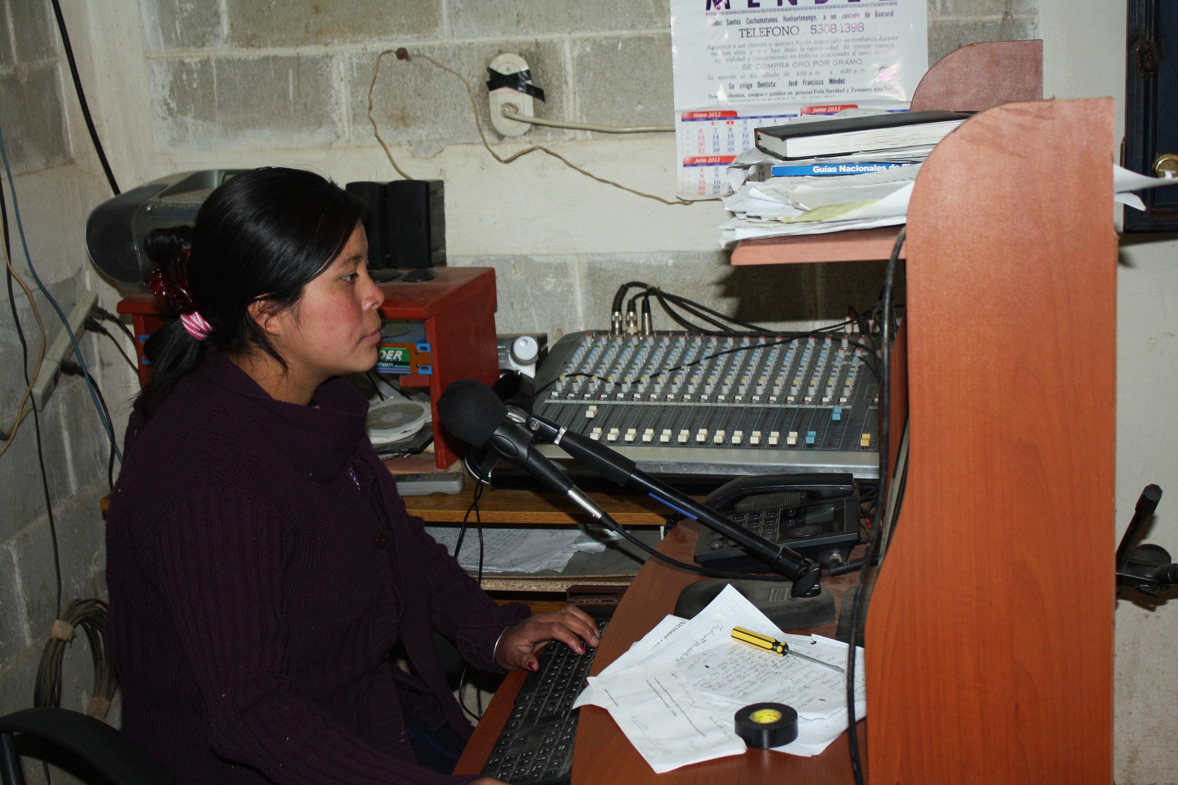 Nicolasa Pablo, 23, gives a broadcast on women’s rights in Mam. Women have thanked her for changing the mentality of their husbands through her broadcasts, Nicolasa says. (Photo by: Brenna Goth)