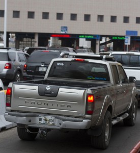 Lines of vehicles crowd the streets of Nogales, Sonora, on their way into the U.S. Many speculate the influx of travel into the U.S. comes from a tax hike from 11 to 16 percent in border regions.(Photo by Kyle Mittan)