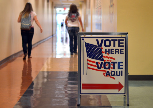 Two students leave a polling place at the University of Arizona on Tuesday Oct. 28, 2014. Photo by Brian Valencia