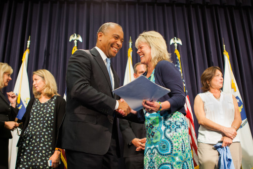 Kathy+Picard+shakes+the+hand+of+Massachusetts+Governor+Deval+Patrick%2C+on+June+26%2C+2014%2C+after+he+signed+into+law+a+bill+that+will+allow+child+abuse+survivors+more+time+to+come+forward+against+their+perpetrators.+Photo+courtesy+of+Kathy+Picard.