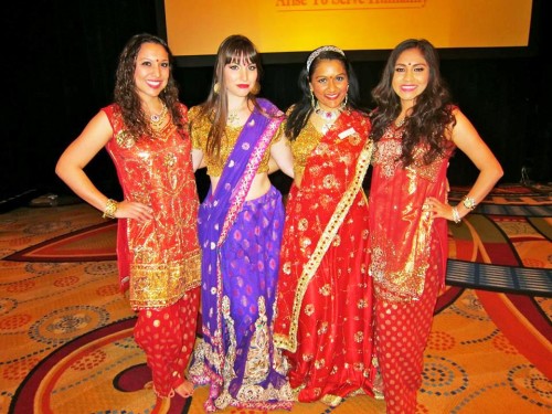 Kriti Agarwal with other dancers dressed in traditional Bollywood clothing. Photo Courtesy Kriti Dance.