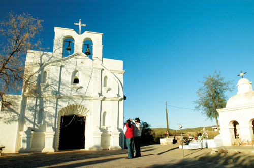 Visitors admire San Antonio  Paduano del Oquitoa mission in Oquitoa Sonora, Mexico. Photo courtesy of Sonora Tourismo. 