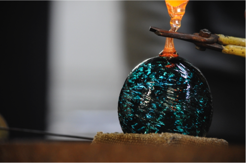 Glass-blown ornament in SGS Hot Shop. Photo courtesy of Sonoran Glass School website. 