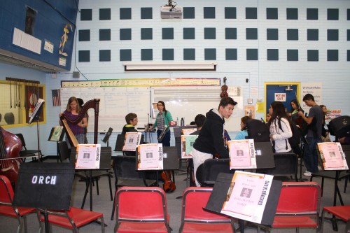 Margie Looney's Orchestra Program meets in their large classroom on the Willcox Middle School grounds. March 23, 2015 Photograph by Alexandra Adamson 