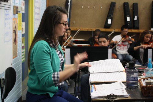 Margie Looney, Willcox High School and Middle School teacher conducts students while they warm up in her Orchestra Program on March 23, 2015. Photograph by Alexandra Adamson 