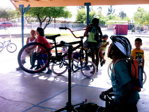 Elementary students brought their bikes to a repair event at Peter Howell Elementary in April.  Photo by Ryan Foley/Arizona News Service