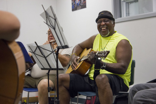 Wes Ricks, professional musician and navy veteran, practices guitar during Guitar for Vets music therapy session at Arizona State Universitys Music Therapy Clinic, 200 E. Curry rd, on Wednesday, April 22, 2015. Arizona veterans are using music therapy to help better their health. Photo by: Rebecca Marie Sasnett / Arizona Sonora News