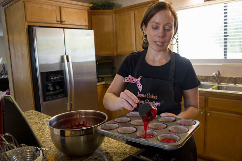 Jamie Pacheco, owner of Jamie-Cakes Bakery Boutique, makes red velvet cupcakes in her home on Thursday, April 30, 2015. Photo by: Rebecca Sasnett / Arizona Sonora News