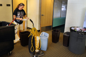 A janitor at Tombstone High School taking out the thrash. Photo by: Emily Lai/Arizona Sonora News