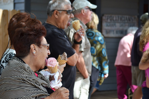 Margarita Morales eating straw berry ice cream (Photo Credit: Sarah Pelfini/ Arizona Sonoran News)