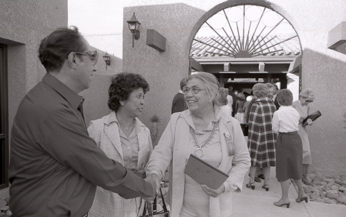 Maria Urquides greets two of La Fronteras godparents at the La Frontera Center building dedication.  Arizona Daily Star file photo taken 01/09/83 by Joe Vitti