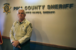 Yuma County Sheriff Chris Nanos stands in his office after stressing his concerns with Ducey's border strike plan. Photo by Emily Lai/Arizona Sonora News. 