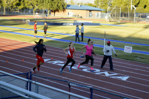 Olympic hopeful Georganne Moline works on her pacing skills with the Arizona track and field team at Roy P. Drachman Stadium.                                 