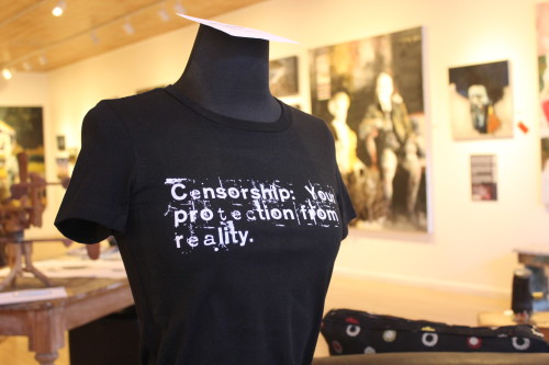 Shirts being sold at Sam Poe Gallery during The Uncensored Show 
Photograph by Tessa Patterson
