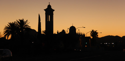 The sun sets over Sixth Avenue in South Tucson. Photo by: Julian Cronen/Arizona Sonora News Service.
