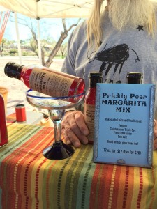 Charlie Allen sells prickly pear margarita mix at the Heirloom farmers' market at Rillito Park on Sunday, Jan. 31. Photo by Lindsey Wilhelm/Arizona Sonora News.