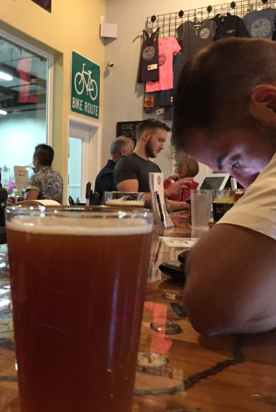 Customer sits at the bar inside Catalina Brewing Company, Marana, Ariz. (Photo by Nick Peppe/ Tombstone Epitaph)