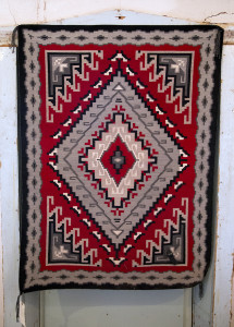 This is an example of a Ganado Red-style Navajo rug. Woven by master weaver Ruby Hubbard, who works at the Hubbell Trading Post National Site visitor’s center, it measures about 36- by 48-inches and took four months to weave.