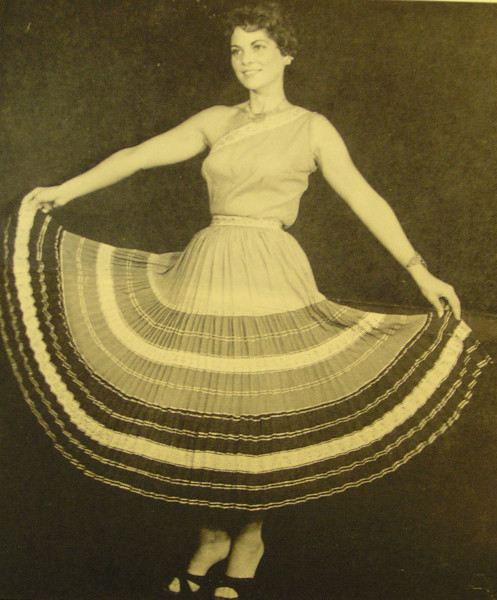 A vintage photograph of a squaw dress shows the dress accordion skirt span and crinkly pleats. (Photo Courtesy of the Arizona Historical Society.)