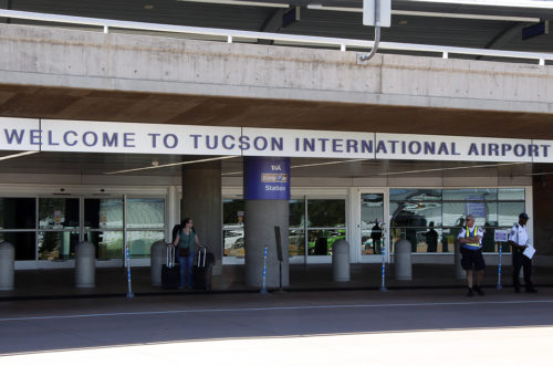 A woman waits to be picked up near baggage claim at the Tucson International Airport on Friday, Sept. 16, 2016. Flyers can now travel to Mexico from Tucson International Airport using the new service Aeromar, a Mexican airline, that will begin new routes starting Monday, Oct. 3, 2016.  (Jessica Kong / Arizona Sonora News Service)