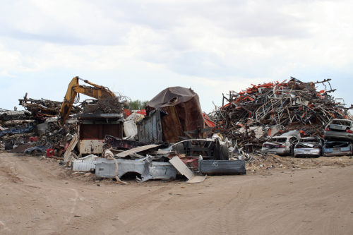 Piles of junk tell a story about what we throw away and what later turns into other usable products or parts at Scrap Metals Recycling in Tucson, Arizona on Saturday, Sept. 3, 2016. (Photo by Sarah Beaudry / Arizona Sonora News)
