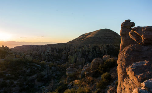 Rock hoodoos dot the landscape as the sun sets over Massai Point in Chiricahua National Monument south of Willcox on Tuesday, Oct. 25, 2016. The monument was founded to protect these features. (Photo by Alex McIntyre / Arizona Sonora News)