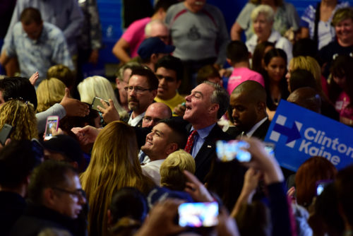 Democratic vice presidential candidate Tim Kaine shakes hands and takes selfies with audience members after the conclusion of his speech at Sunnyside High School in Tucson, Ariz. on Thursday, Nov. 3, 2016. (Photo by Rebecca Noble / Arizona Sonora News)