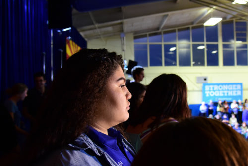 Sunnyside junior and student council member Myranda Perales looks on from the balcony before a speech from Democratic vice presidential candidate Tim Kaine at Sunnyside High School in Tucson, Ariz. on Thursday, Nov. 3, 2016. Perales supports Clinton and Kaine because of their stance on education and taxes. (Photo by Rebecca Noble / Arizona Sonora News)