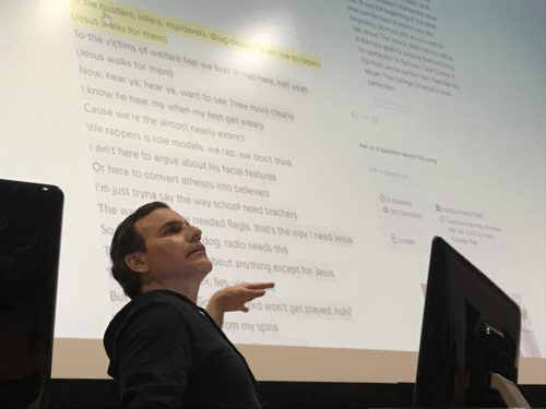 University of Arizona professor Alex Nava lecturing about Christianity using Kanye West lyrics. Photo by John Ricker/Arizona Sonoran News Service. 