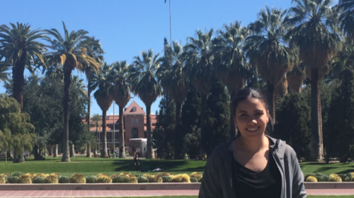 Karina Gabino stands on the University of Arizona campus after graduating in Criminal Justice last semester. (Photo by: Conor Redmond/Arizona Sonora News)