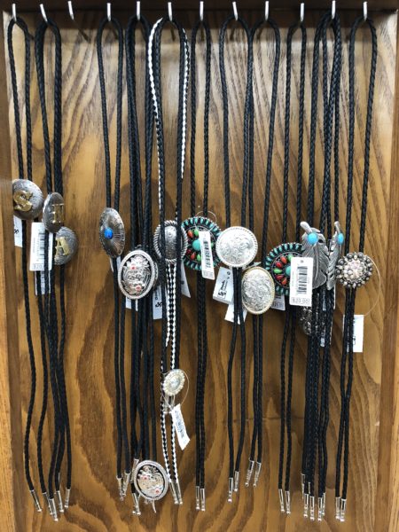 Bolo ties hanging up. 