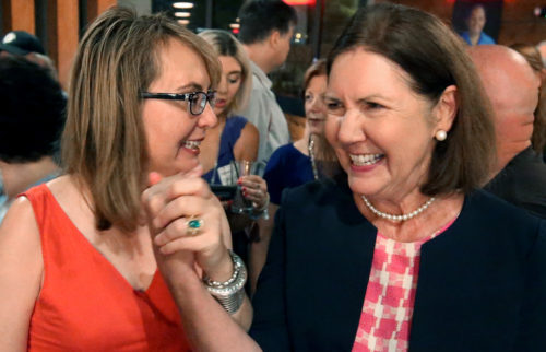 Gabby Giffords, left, holds the hand of Ann Kirkpatrick, who is running for office in CD2, on August 28, 2018, Tucson, Ariz. Kirkpatrick, who held office until 2017 in CD1, faced a lawsuit to remove her from the Democratic primary ballot. (Photo courtesy Arizona Daily Star)