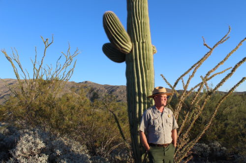 Biologist Don Swann peers toward Tucson from Saguaro National Park -- North. © Kaite Fletcher, 2018