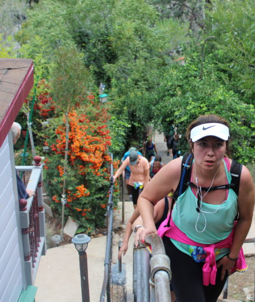 Participant climbs the final staircase in the Bisbee 1000 before finishing the race. The Great Stair Climb was on October 20th 2018 and 1333 people ran the race. Photo by: J.D. Molinary for Arizona Sonora News.