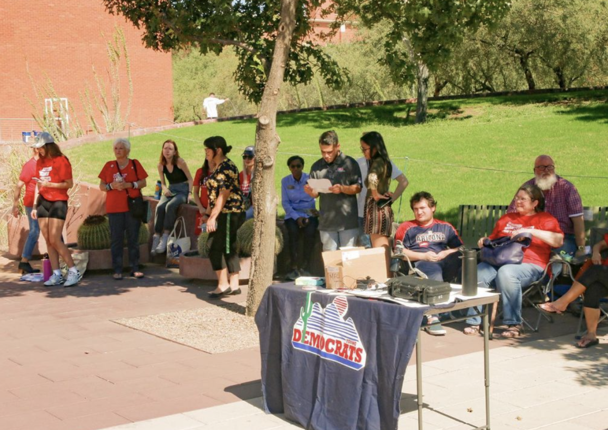 Members of University of Arizona Young Democrats club table at a gun rally in 2022. The club has been dormant since late 2023. Courtesy of Arizona Young Democrats via Instagram.