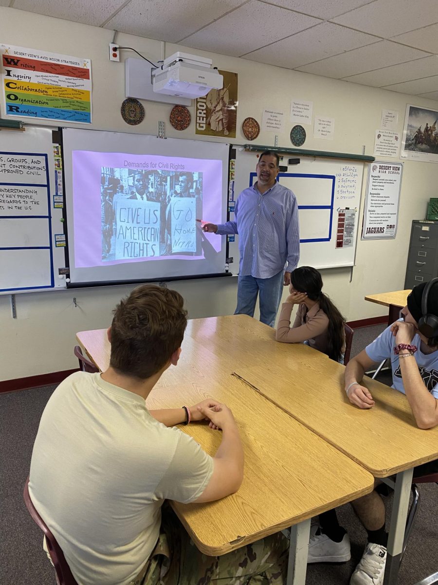 Desert View High School teacher Samuel Mendivil introduces his students to a new topic.

