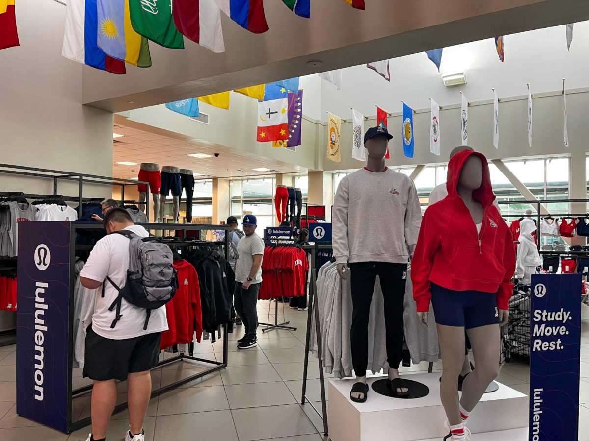 Shoppers lined up hours before the UA BookStores opened on Friday, March 22. Once it opened, the store limited the number of customers who could enter at a time. 