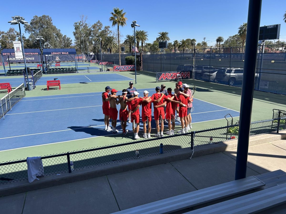 Head Coach Clancy Shields talks to his team before they start practice on Feb. 25, 2025 at the Robson Tennis Center.