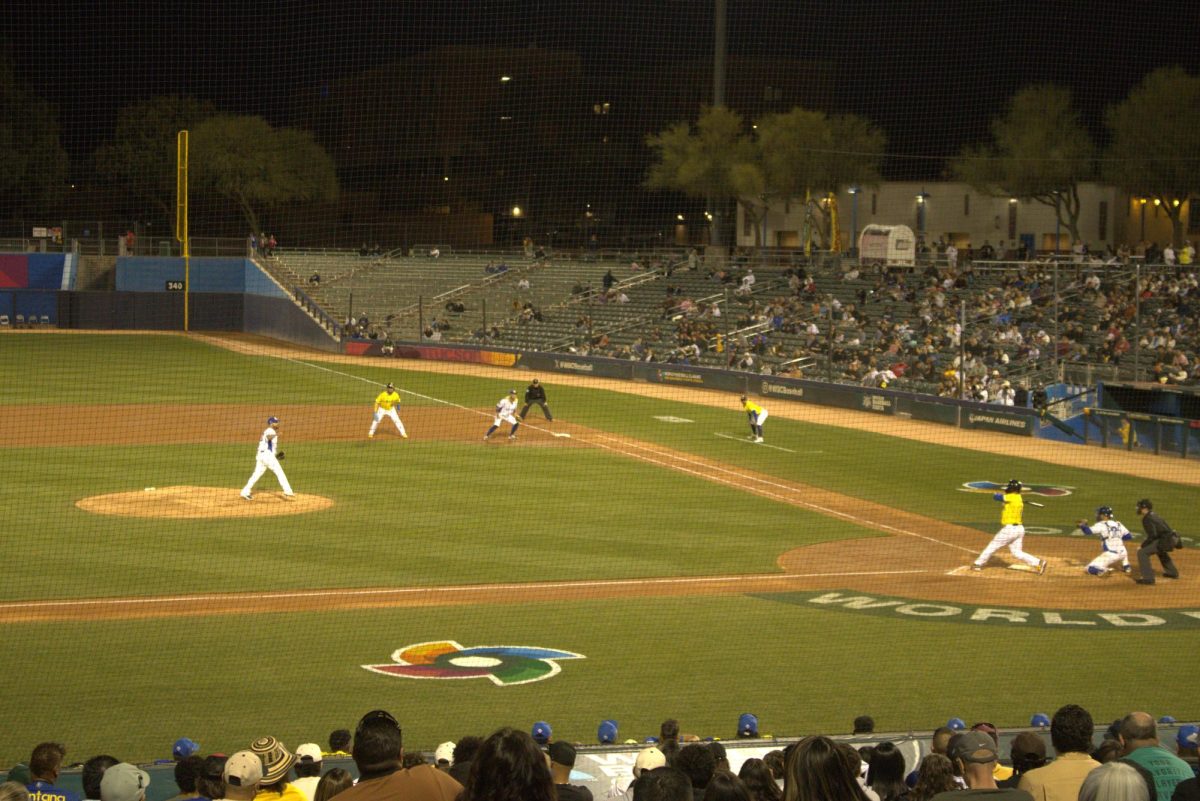 Brazilian pitcher Bo Takahashi throws a fastball to Colombian Reynaldo Rodriguez in the World Baseball Classic on Sunday, March 2, 2025. (Photo by Jackson Hirz)
 
