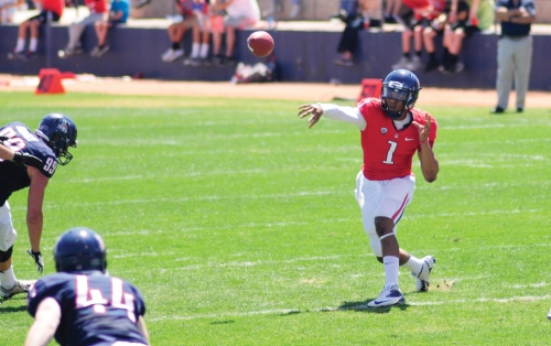 Jesse Scroggins (1) will have a shot to compete with B.J. Denker and Anu Solomon for Arizona's starting quarterback job. Photo by Tyler Baker/Arizona Daily Wildcat