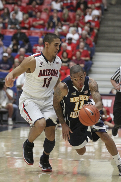 Gabe Rogers (right) was a senior in Jack Murphy's first year at NAU, and he led the team in scoring. Murphy expects Rogers to become a professional at some level, be it NBA or overseas. Photo by Larry Hogan/Arizona Daily Wildcat