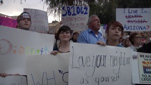 Protesters at the Arizona State Capitol on Feb. 24, urging Governor Jan Brewer to veto Senate Bill 1062.
