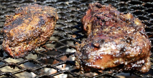 Steak, from The Grill out of Vail, cook on the grill at the Feria de Sur Tucson on Sunday, April 6, 2014. (Photograph by Ryan Revock)
