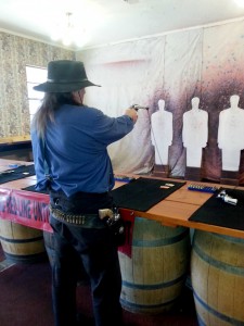 Randy Davis opened the Big Iron Shooting Gallery on Allen Street after retiring from the Los Angeles police force. The guns available to shoot are externally the same size as a 1875 Colt. 