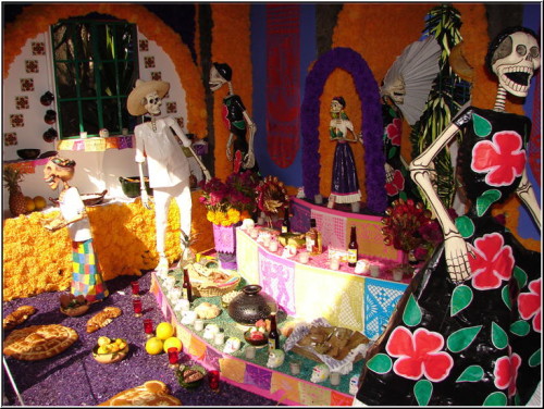 Offerings of food are placed for dead loved ones. Photo credit to Flickr user Omar Landeros. Licensed under Creative Commons. http://tinyurl.com/p7mmo9f