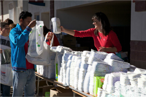 Volunteers hand out goods at Hope Fest Tucson. Photo courtesy of Hope Fest Tucson website.