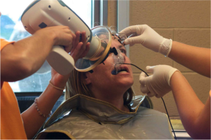 Patients receive dental and medical services at Tucson Hope Fest. Photo courtesy of Hope Fest Tucson website. 