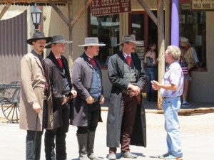 A visitor to Tombstone chats with historical reenactors on Allen Street. (Photo by: Kaleigh Shufeldt/Arizona Sonora News)